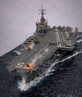 Diorama Naval Moderno – Porta-Aviões em Operação no Oceano (Miniatura Artesanal)